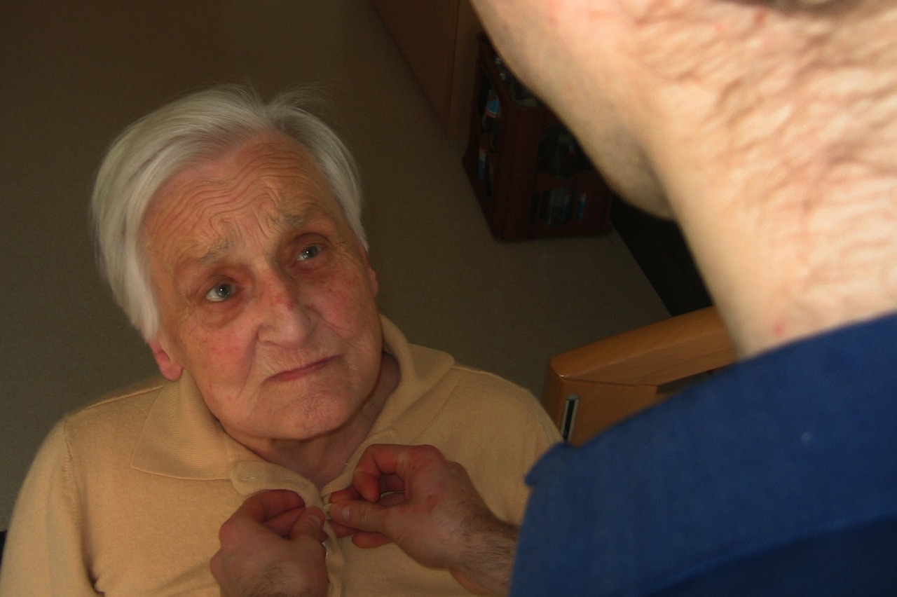 caregiver attending to elder